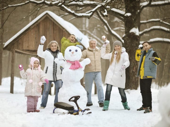 10 Winter Activities That Made My Kids Forget About Their Screens 59 Snowman Building